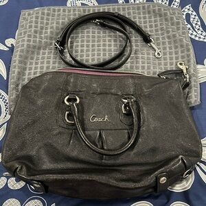 Coach purse black leather with silver accents. BK1